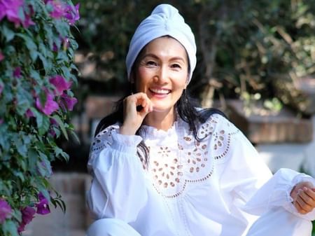 japanese woman in a white suit