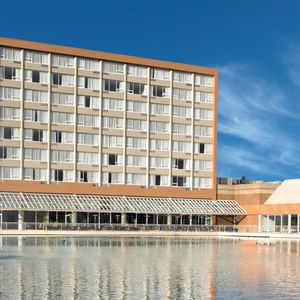 Exterior of Coast Chilliwack Hotel by APA with pond
