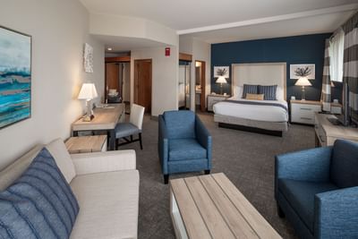 Partial View Executive Suite bed &living room at Bay Club Hotel