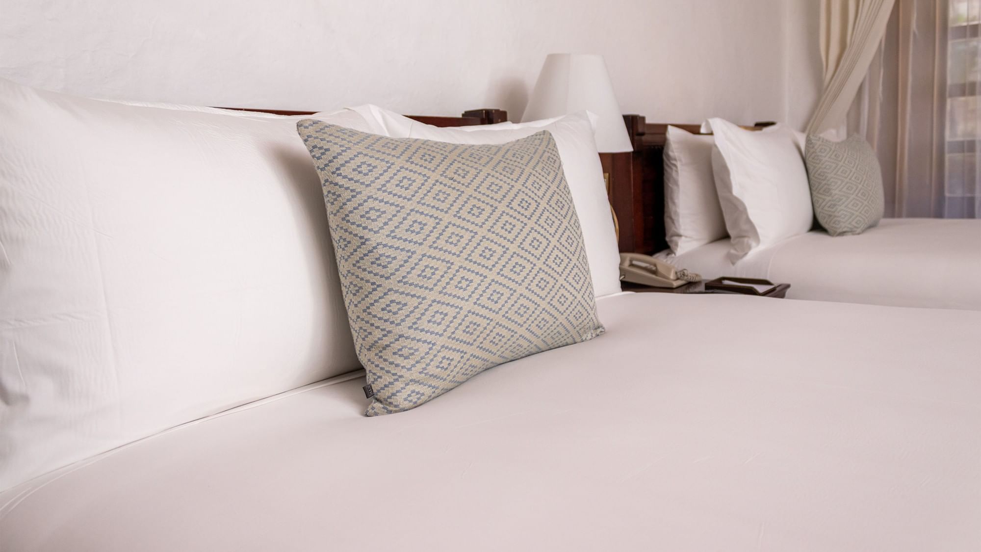 Camas dobles en habitación Gran Clase en Quinta Real Oaxaca en Oaxaca de Juárez