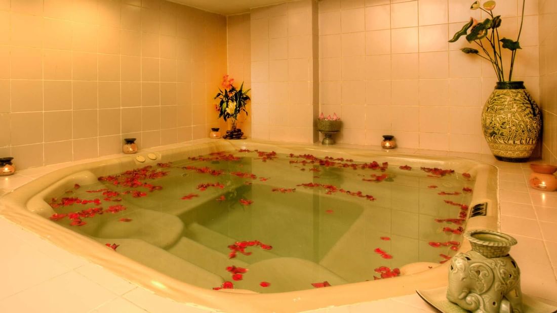 Whirlpool bath with rose petals in The Spa at Sunway Hotel Phnom Penh