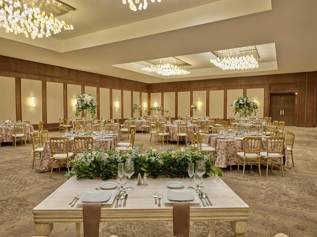 The wedding hall arrangement with tables & chairs at FA Hotels