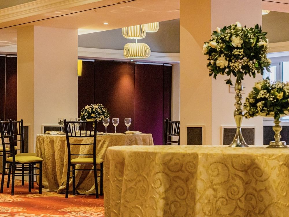 Floral decors on banquet tables in Perlas C at Gamma Hotels
