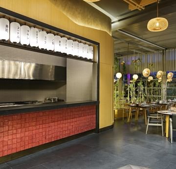 Exterior of Nori Japanese Restaurant with dinning area at Titanic Deluxe Lara