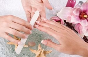 Lady having a manicure in Reflection Spa & Salon at Lake Buena Vista Resort Village & Spa