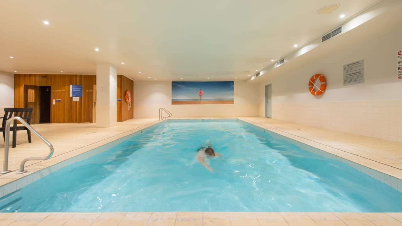 Indoor swimming pool area at Novotel Glen Waverley