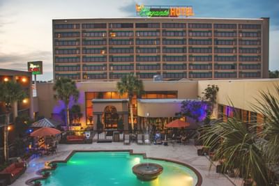 Exterior view of the facade & pool at MCM Elegante Beaumont