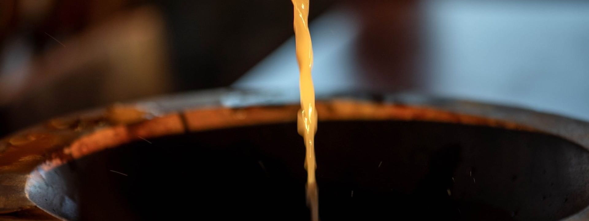Liquid pouring into copper vessel at Warwick Fiji Resort and Spa Korolevu