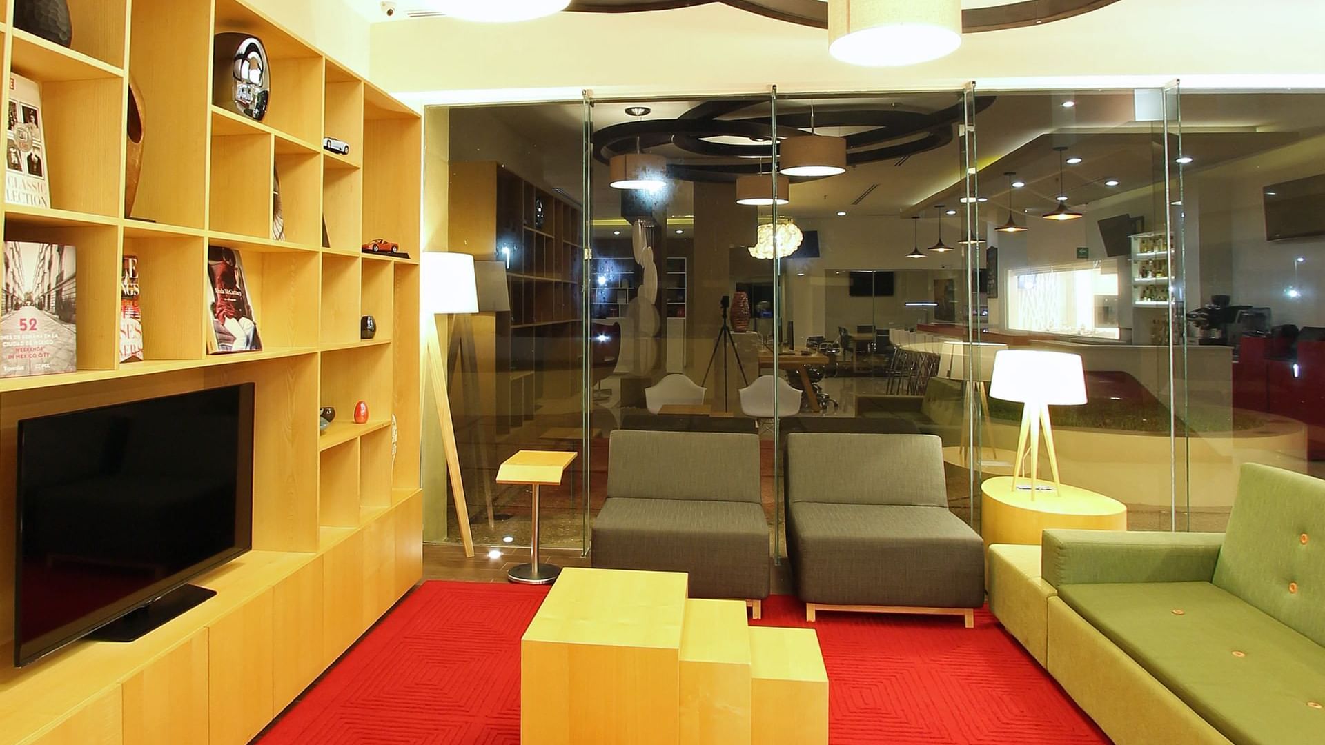 TV & shelves in lobby lounge area at Fiesta Inn Coatzacoalcos