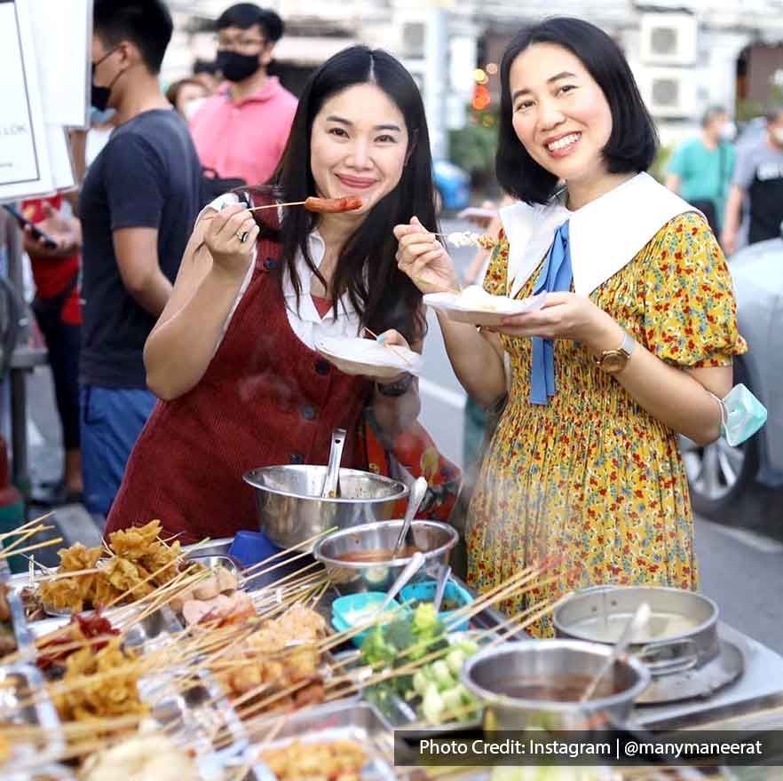 Two tourists were savouring the delights of Penang street foods - Lexis Suites Penang