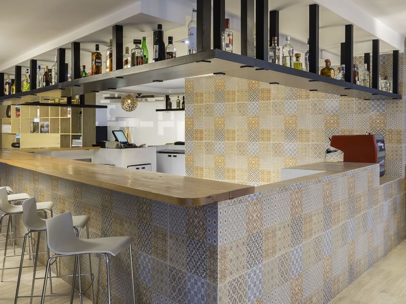 A bar with a modern look at Fiesta Inn Hotels