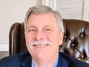 Portrait of Andrew Taymans, Senior Vice President in Asset & Revenue Management at GF Hotels & Resorts