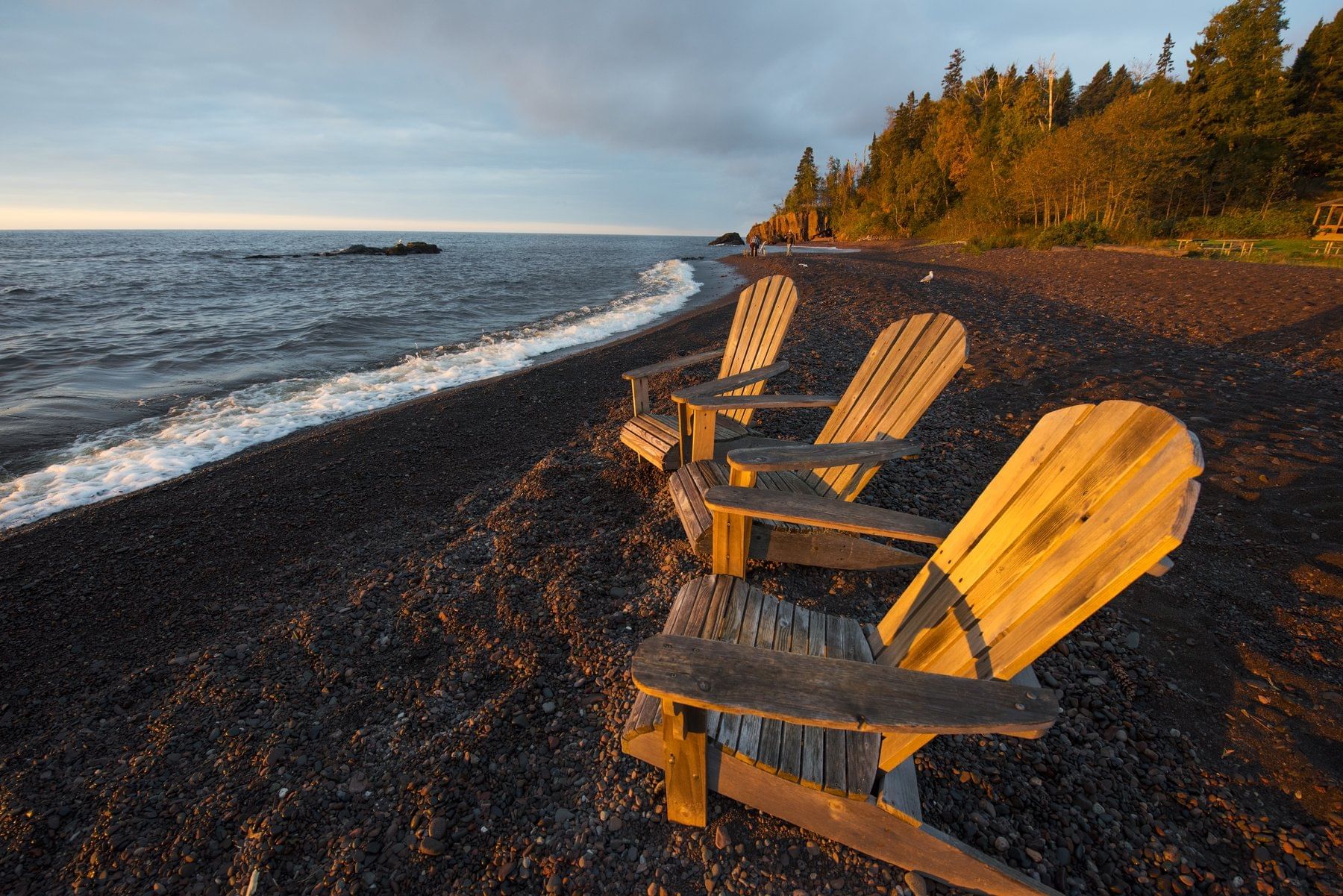 Three chairs by the beach near Lutsen Resort