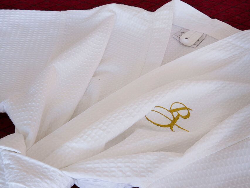 Special bathrobe in Premium City View Twin Room at Royal on the Park hotel