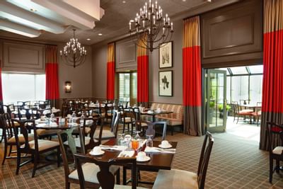 Dining table set-up in 21 Lake Restaurant at Ethan Allen Hotel