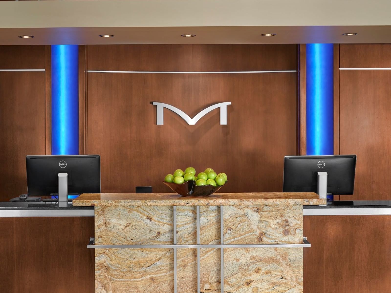 Hotel Reception with logo emblem at Metterra Hotel on Whyte