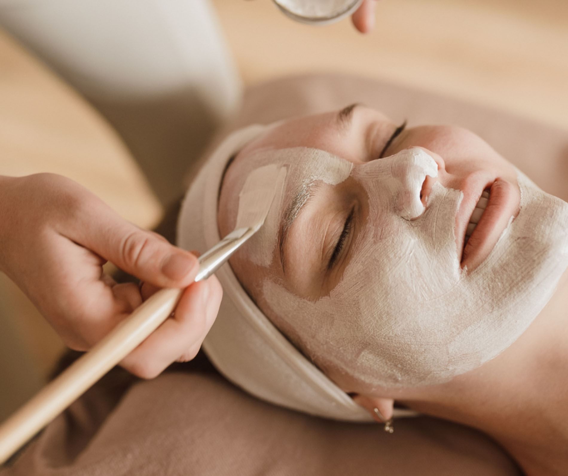 Close-up of lady receiving a facial mask in the Spa at Shangri-La Monkey Island