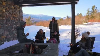 Group of people sitting outside at Topnotch Stowe Resort