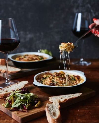 Close-up of a lady dining at Sloane Square Hotel