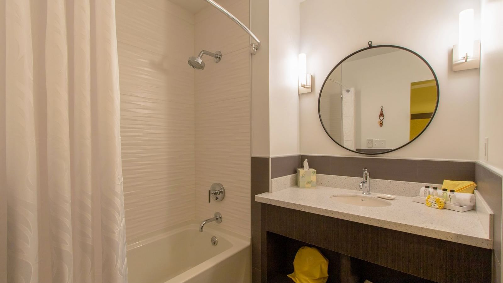 Vanity & bathtub in England-themed Room at The Whittaker Inn