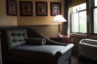 Chaise lounge chair in a suite's resting area