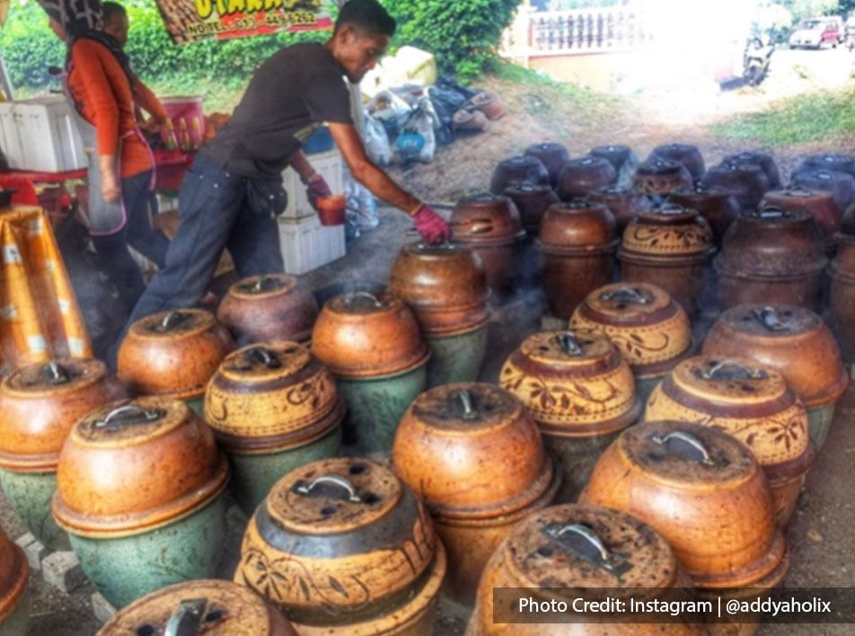 Malaysia port dickson local food man baking ayam bakar pasu side view