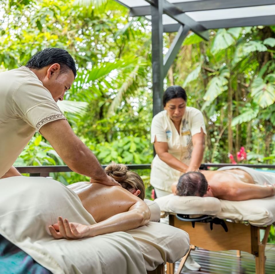 Couple having a Spa treatment outdoors at Hideaway Rio Celeste