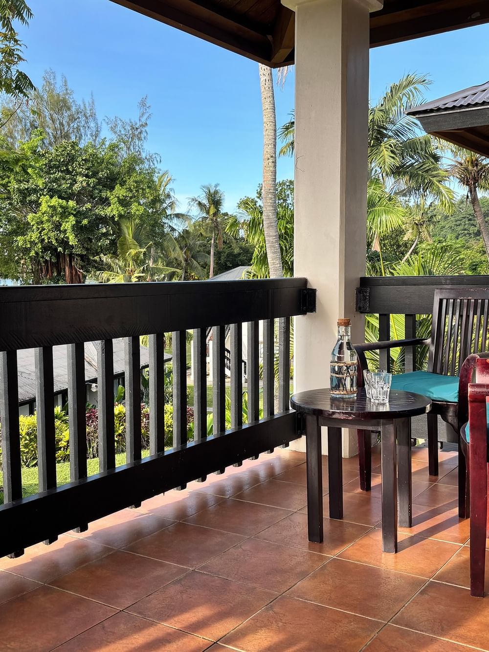 Balcony with chairs and lagoon view at Warwick Le Lagon - Vanuatu, Efate.