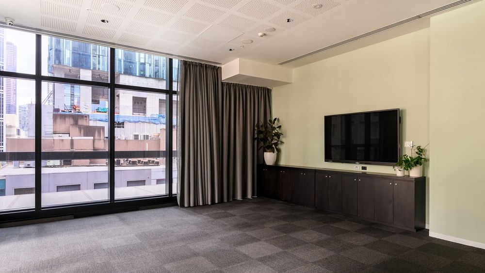 Interior of Guilford Lane 2 with TV at Melbourne Central Hotels