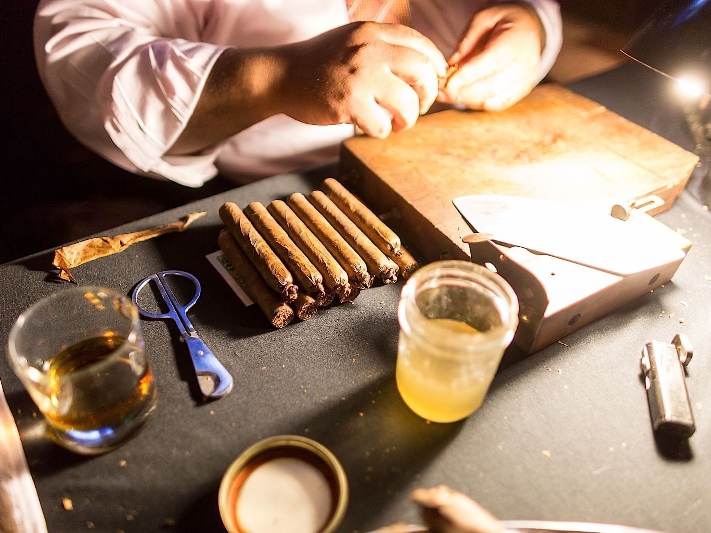 A man making a Cigar Roller at The Mayo Hotel