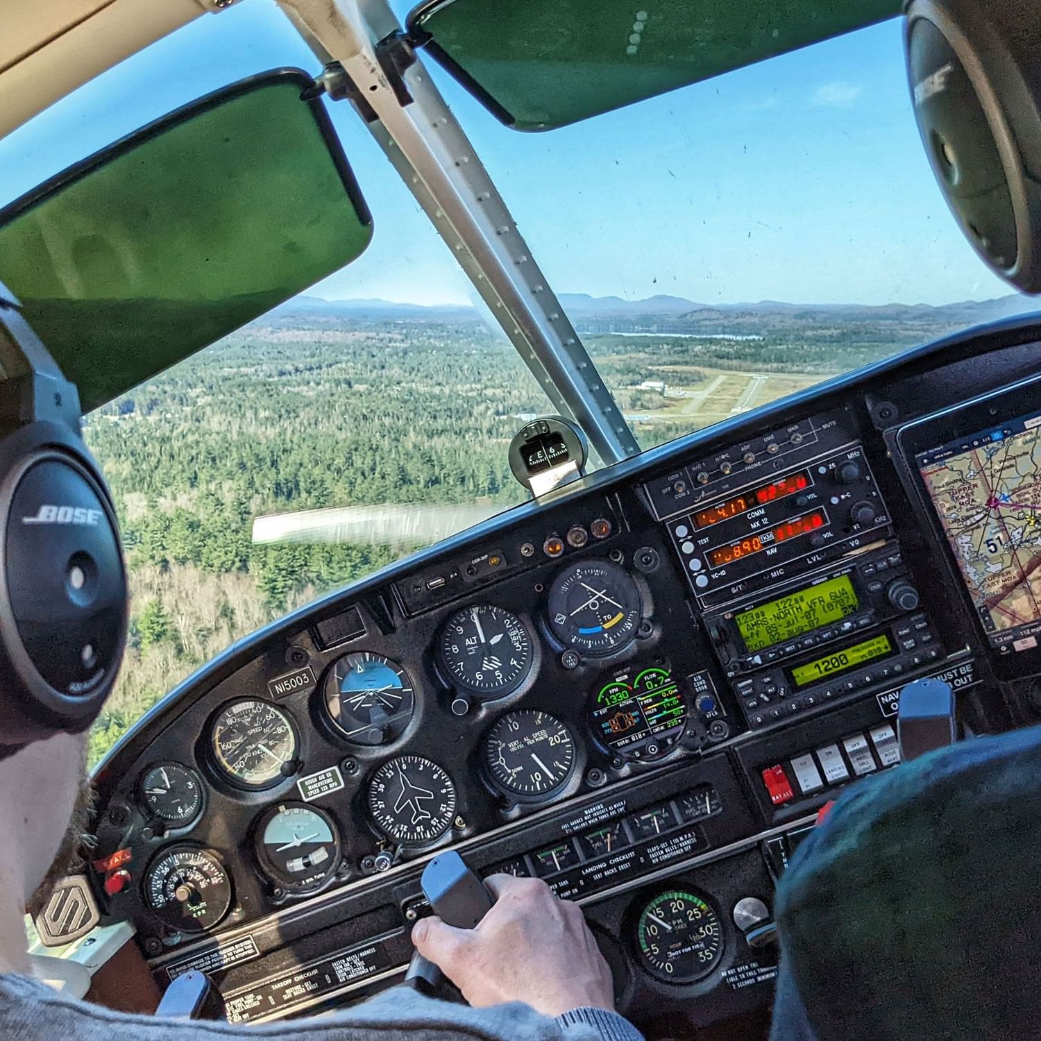 Cockpit view from a small aircraft landing near High Peaks Resort