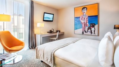 Creative art hung by the bed in Business Room at Starling Hotel Lausanne Switzerland accommodation