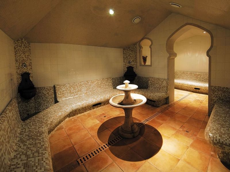 Massage room with seating at Le Grand Hôtel des Thermes