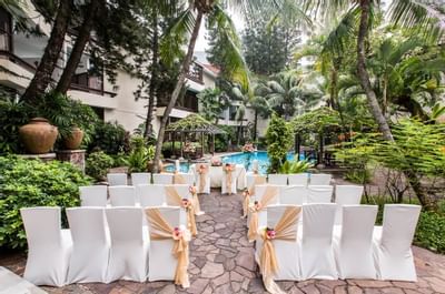 Wedding Ceremony by the outdoor pool at Goodwood Park Hotel