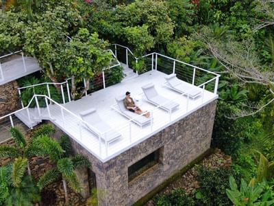 Aerial view of Retreat Costa Rica with rooftop lounge beds