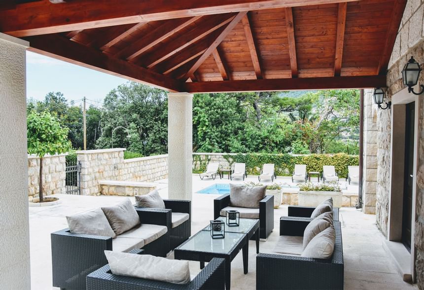 An Outdoor seating area by the pool at Villa Franica