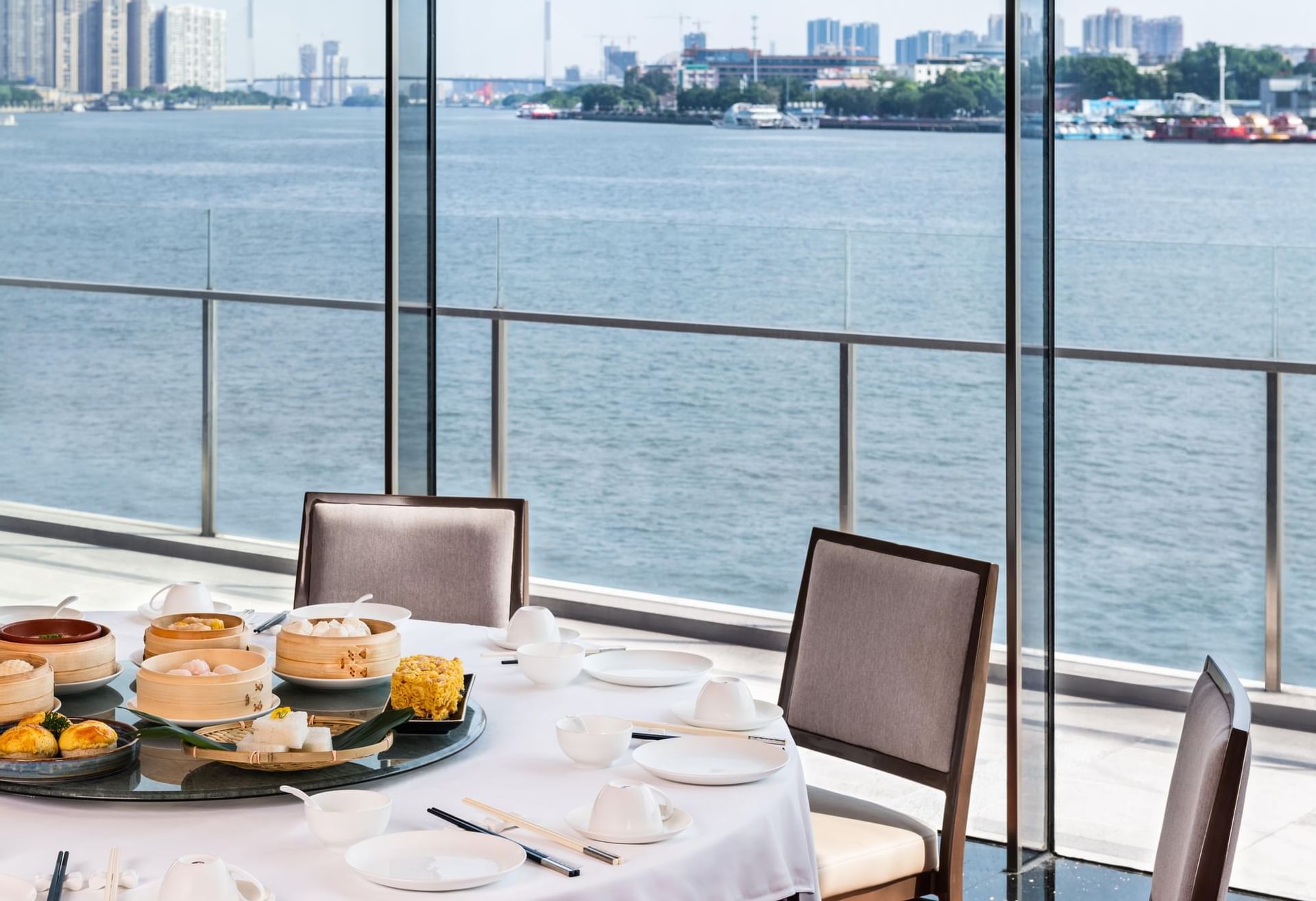 Breakfast table with city view at White Swan Hotel