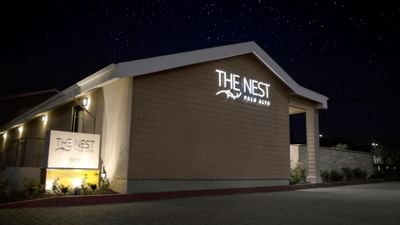 Exterior view of The Nest Palo Alto at night