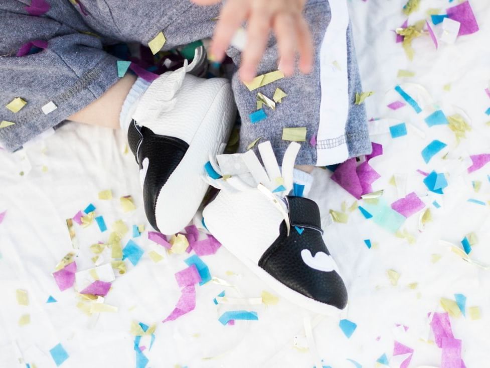 Close-up of a baby on confetti at Carlton Hotel Singapore