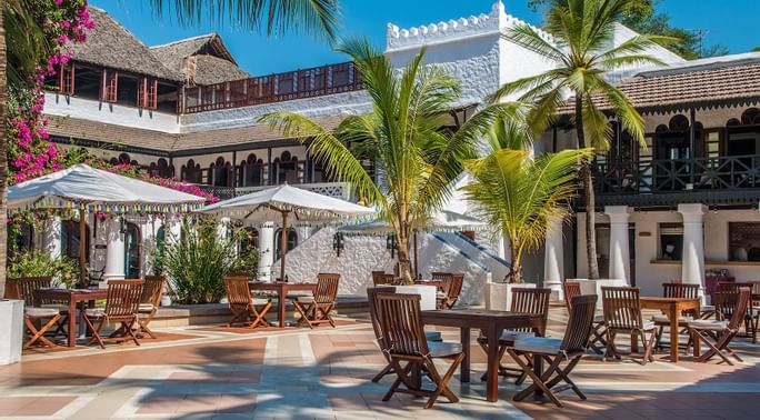 Sokoni with outdoor dining area at Serena Beach Resort & Spa