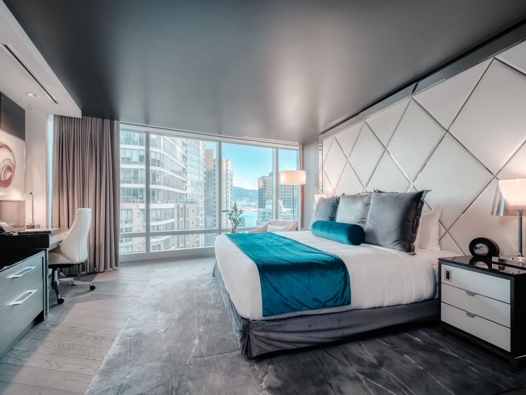 Elegant Executive King room with cityscape view at Paradox Vancouver in Vancouver.
