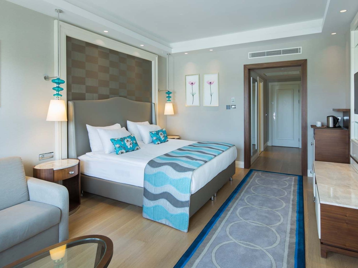 Lounger & coffee maker by the bed in Superior Room at Titanic Deluxe Golf Belek