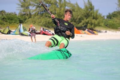 Man Kite boarding near the beach at The Somerset On Grace Bay