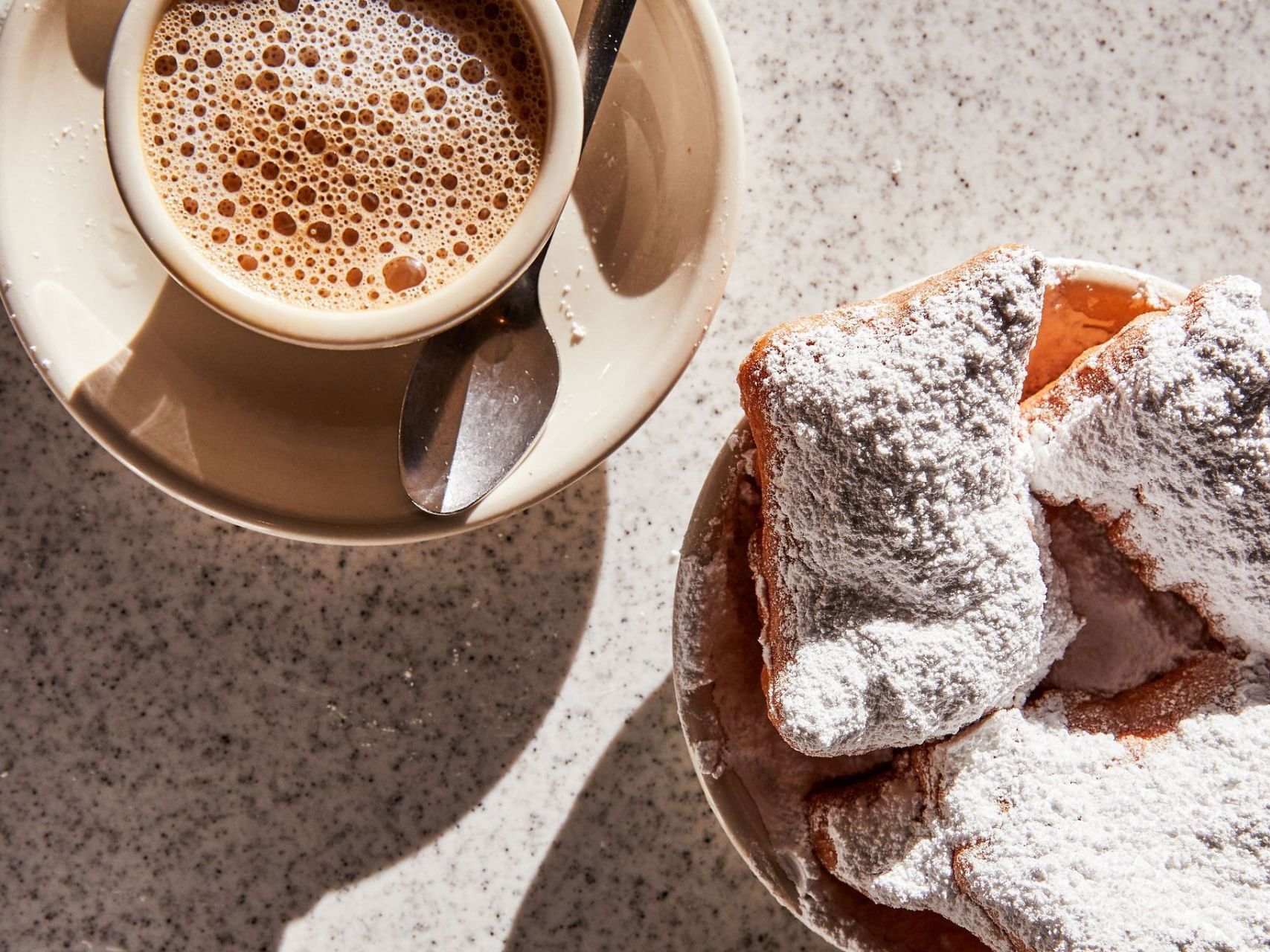 Tea & Beignets served in Café du Monde near Audubon Cottages