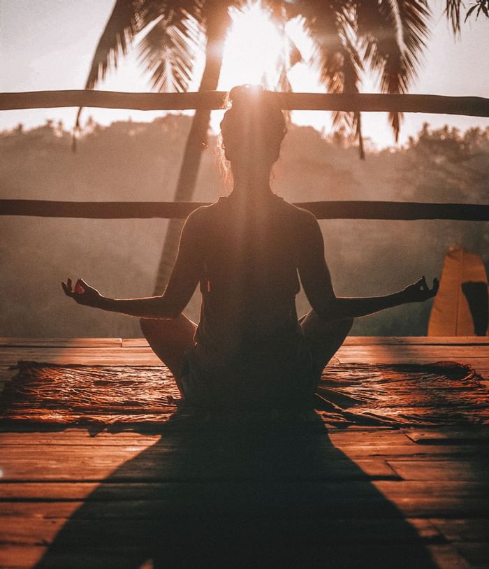 Lady involving in yoga at Diplomat Resort