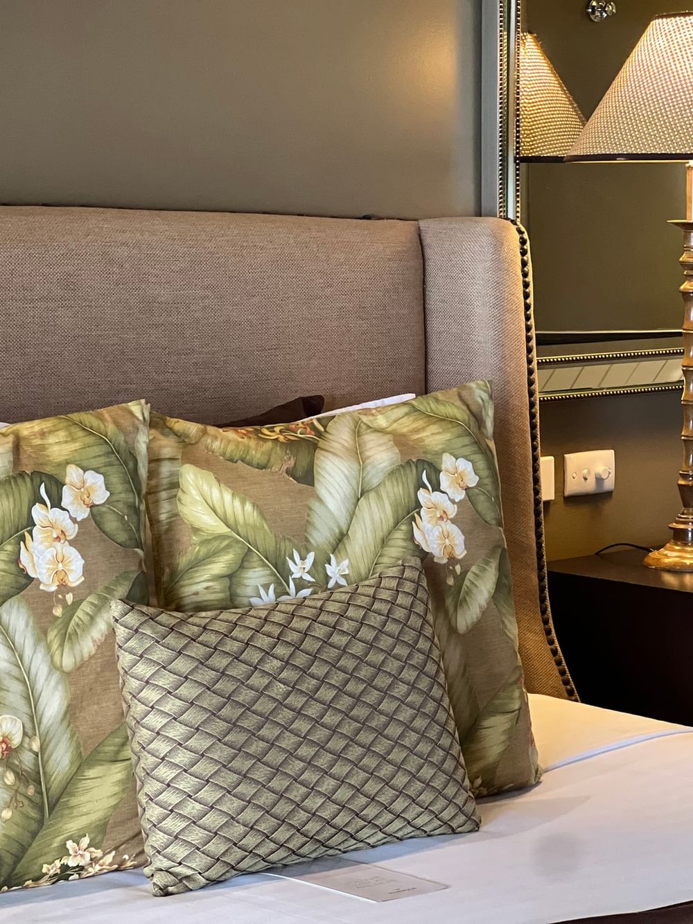 Cozy Erakor Residence bedroom with tropical pillows and elegant decor at Warwick Le Lagon in Efate.