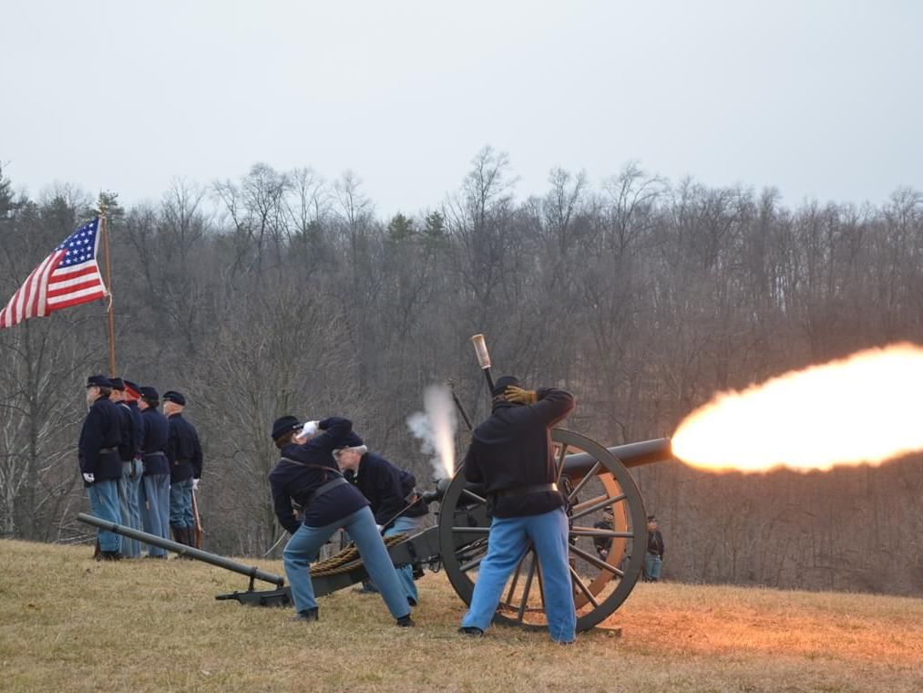 people firing a cannon
