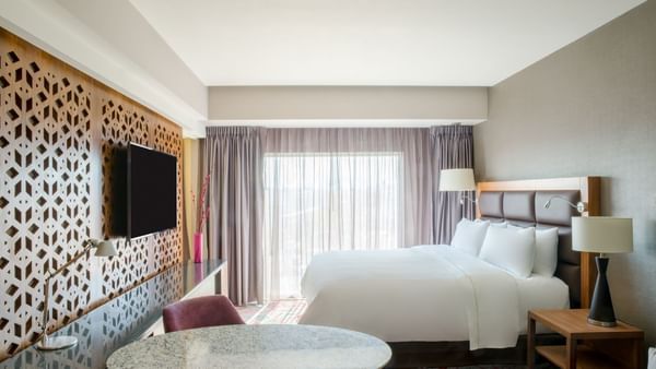 Interior of Junior Suite 1 King bedroom at FA Hotels & Resorts