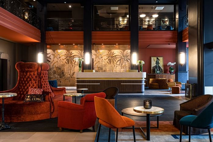 Colorful chairs in the lobby & reception area at Oceania Hotels