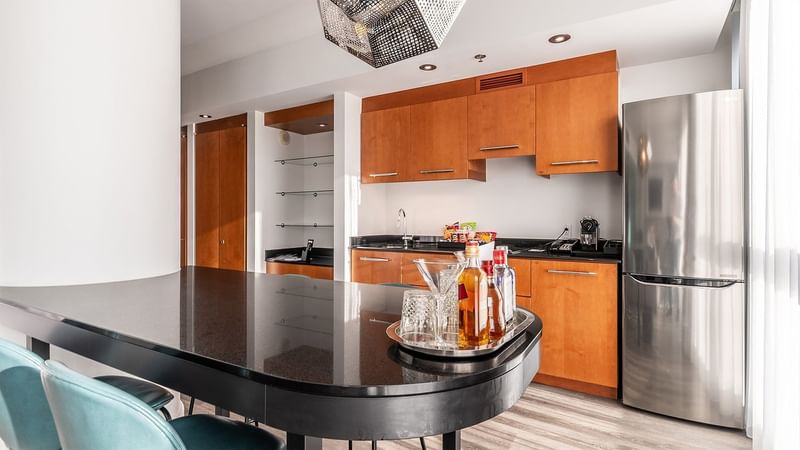 Kitchenette with dining table in Penthouse Suite Crescent at Warwick Le Crystal